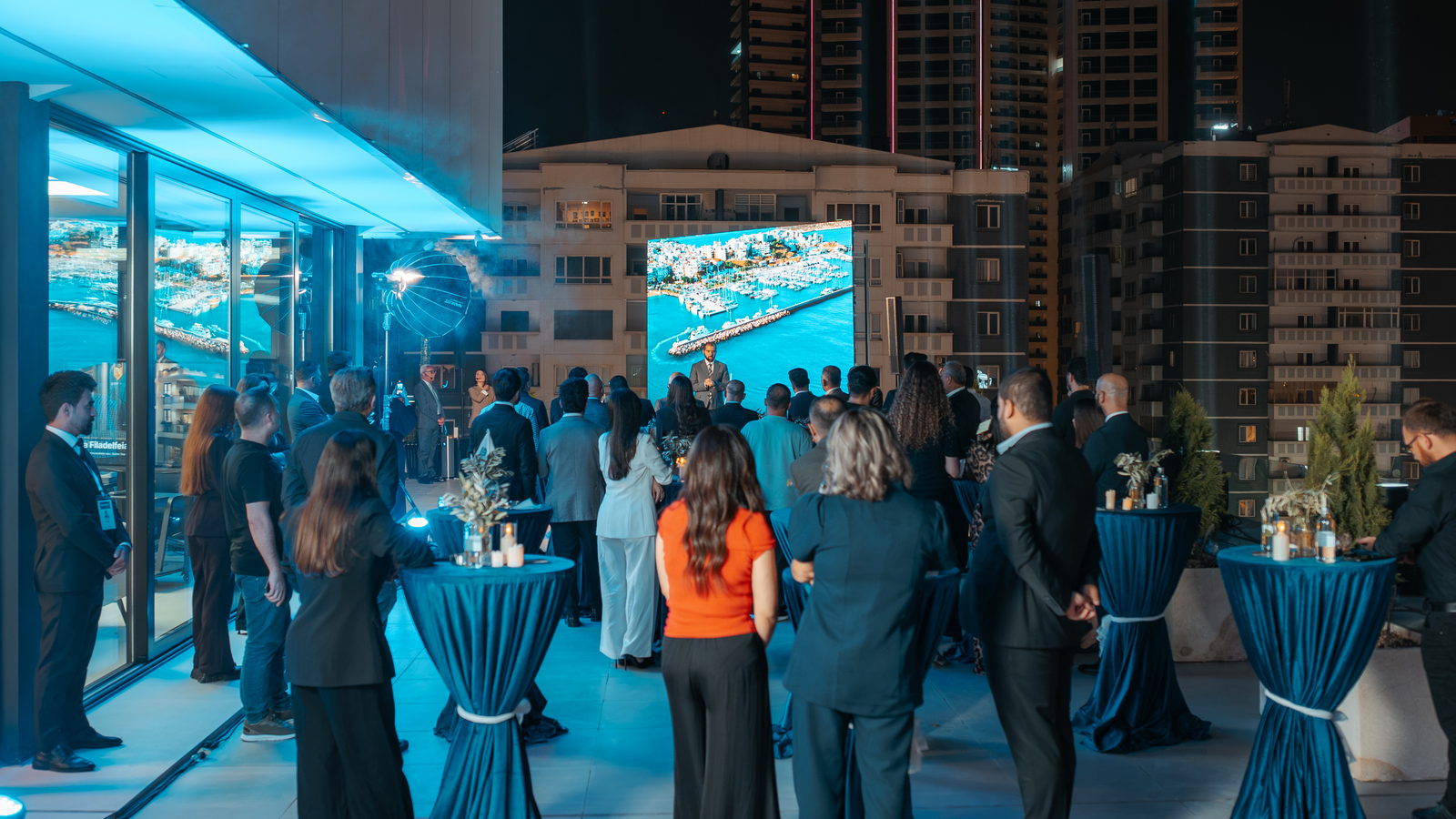 Guests gathered around tables at Nexora’s Golden Night